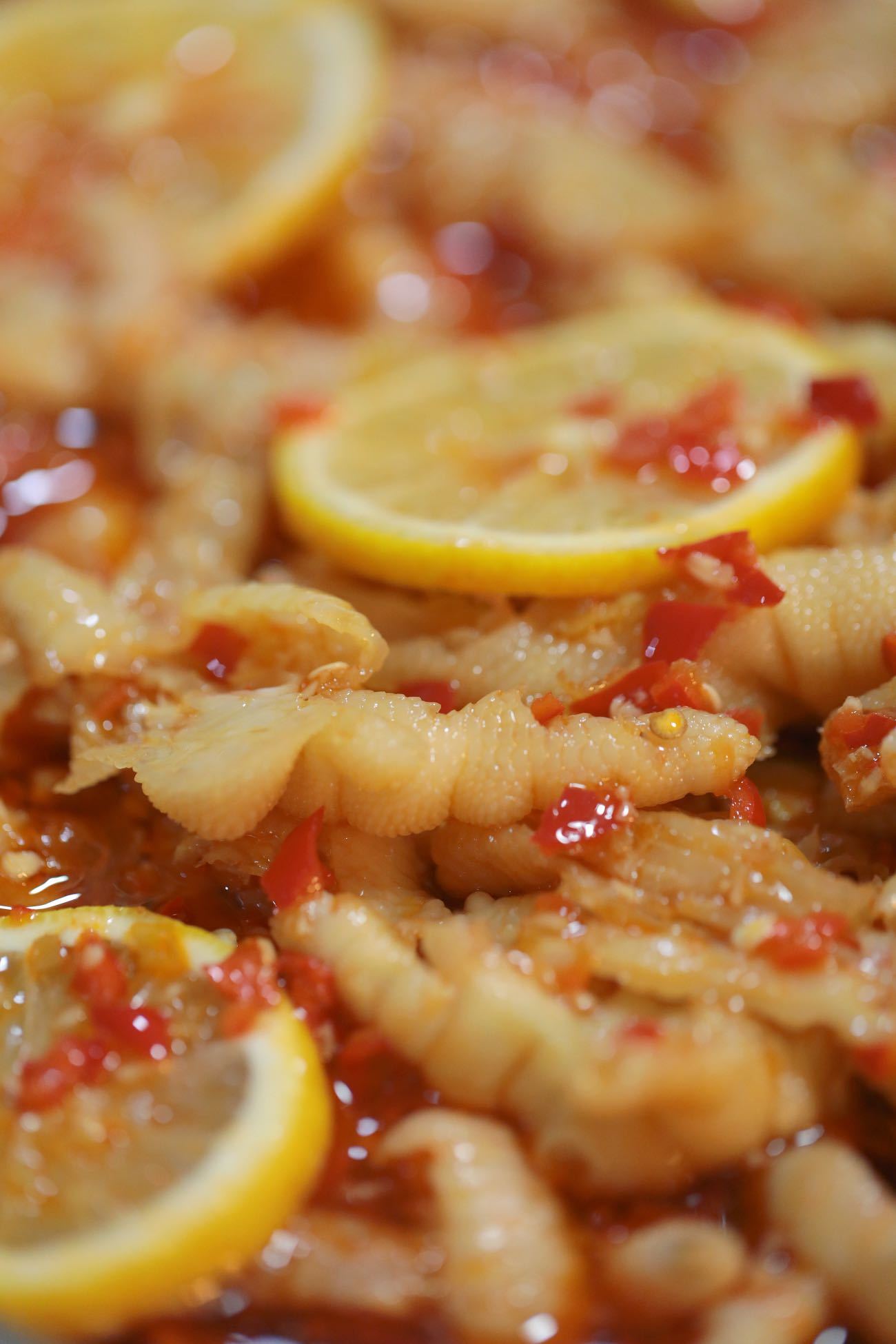 一口“凤爪”，一场味觉的南方旅行——大缸鲜榨柠檬汁泡的鸡爪