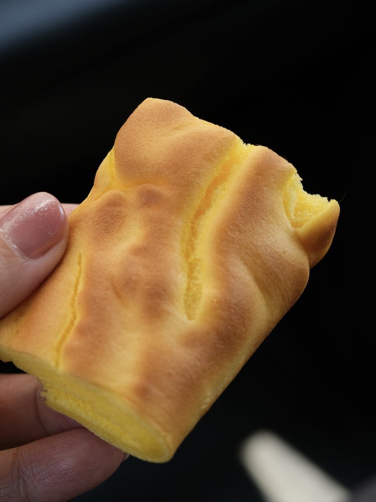 十五蛋黄一卷情：林小丫虎皮卷的细腻与深情